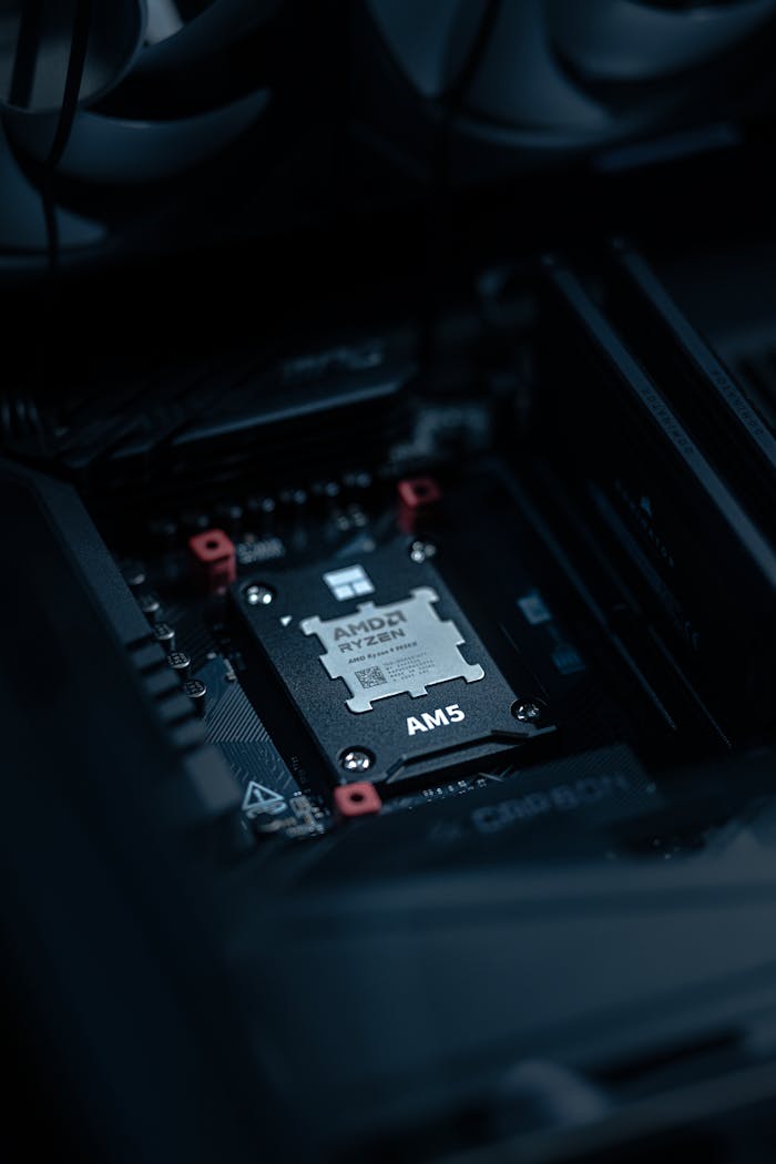 our-services-3 Detailed view of an AMD Ryzen processor securely placed on a motherboard, ideal for tech enthusiasts.
