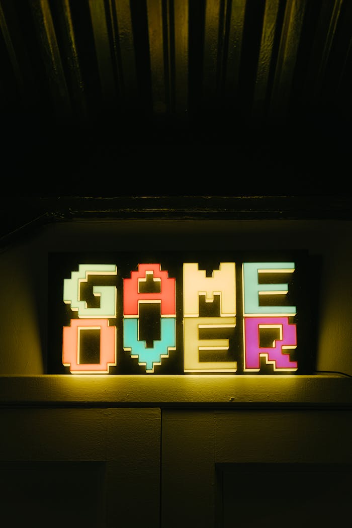 our-services-2 Bright neon 'Game Over' sign in retro style, perfect for gaming nostalgia